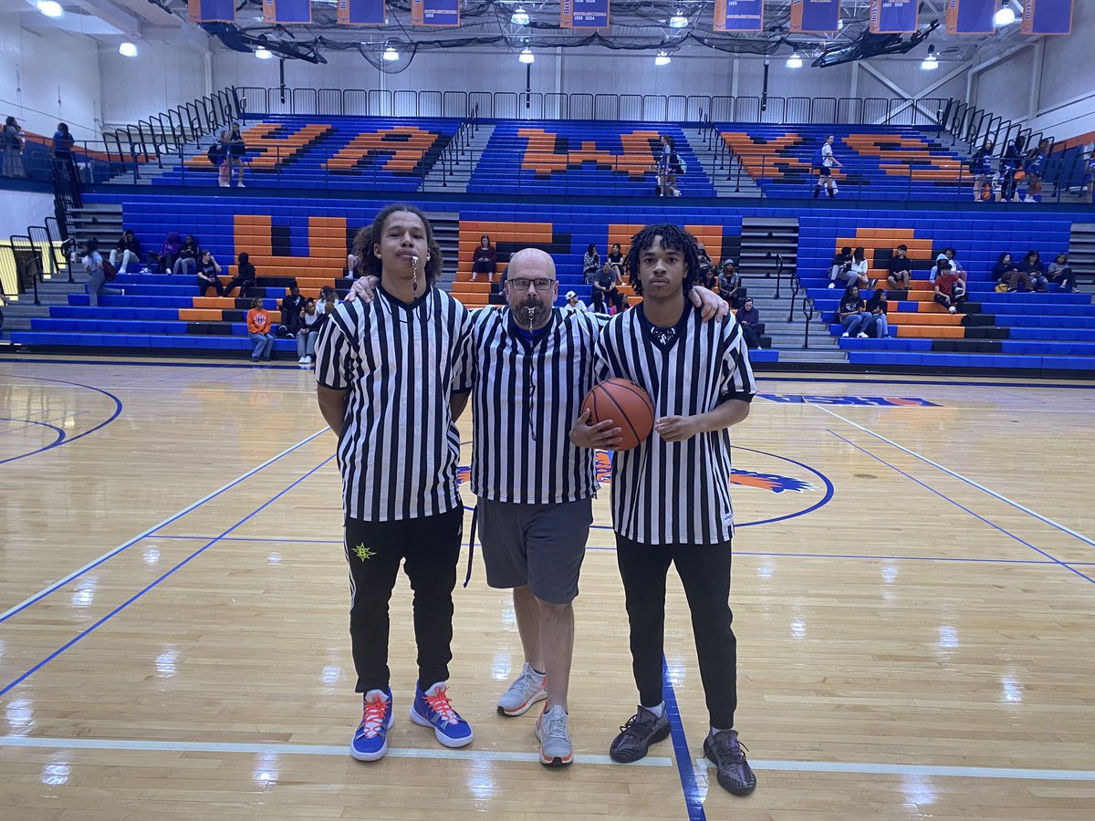CoachMcB23's tweet photo. Staff got the W tonight! Big shoutout to our officials @HEHSHawks Principal Alther alongside @HEHSbball guards @_natecleveland_ and @trendellw3 

A great night for a great cause! #OneHoffman #UBUNTU https://t.co/DGQhn1y79t