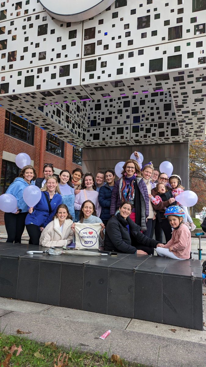 Deakin's tweet photo. 📷 #IDM2023 | Today is International Day of the Midwife! To celebrate the day, #Deakin midwifery students and midwifery lab support team walked along the #Geelong waterfront to mark the occasion. https://t.co/Cso45g6SmU