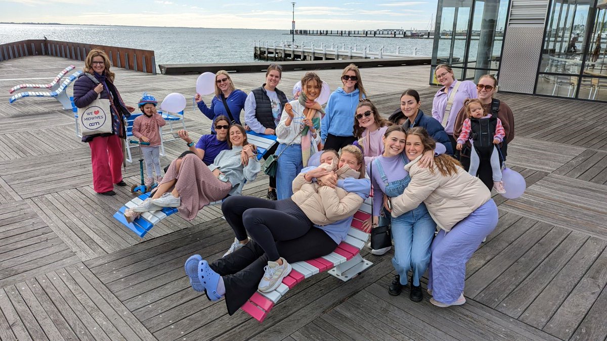 Deakin's tweet photo. 📷 #IDM2023 | Today is International Day of the Midwife! To celebrate the day, #Deakin midwifery students and midwifery lab support team walked along the #Geelong waterfront to mark the occasion. https://t.co/Cso45g6SmU