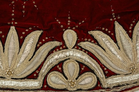 This is the cope that will be worn by our Dean, the Very Reverend Dr David Hoyle, at tomorrow's #Coronation. Made from crimson velvet and decorated with embroidered flowers and stars, the cope was made for the coronation of Charles II in 1661 and is the oldest in our collection.