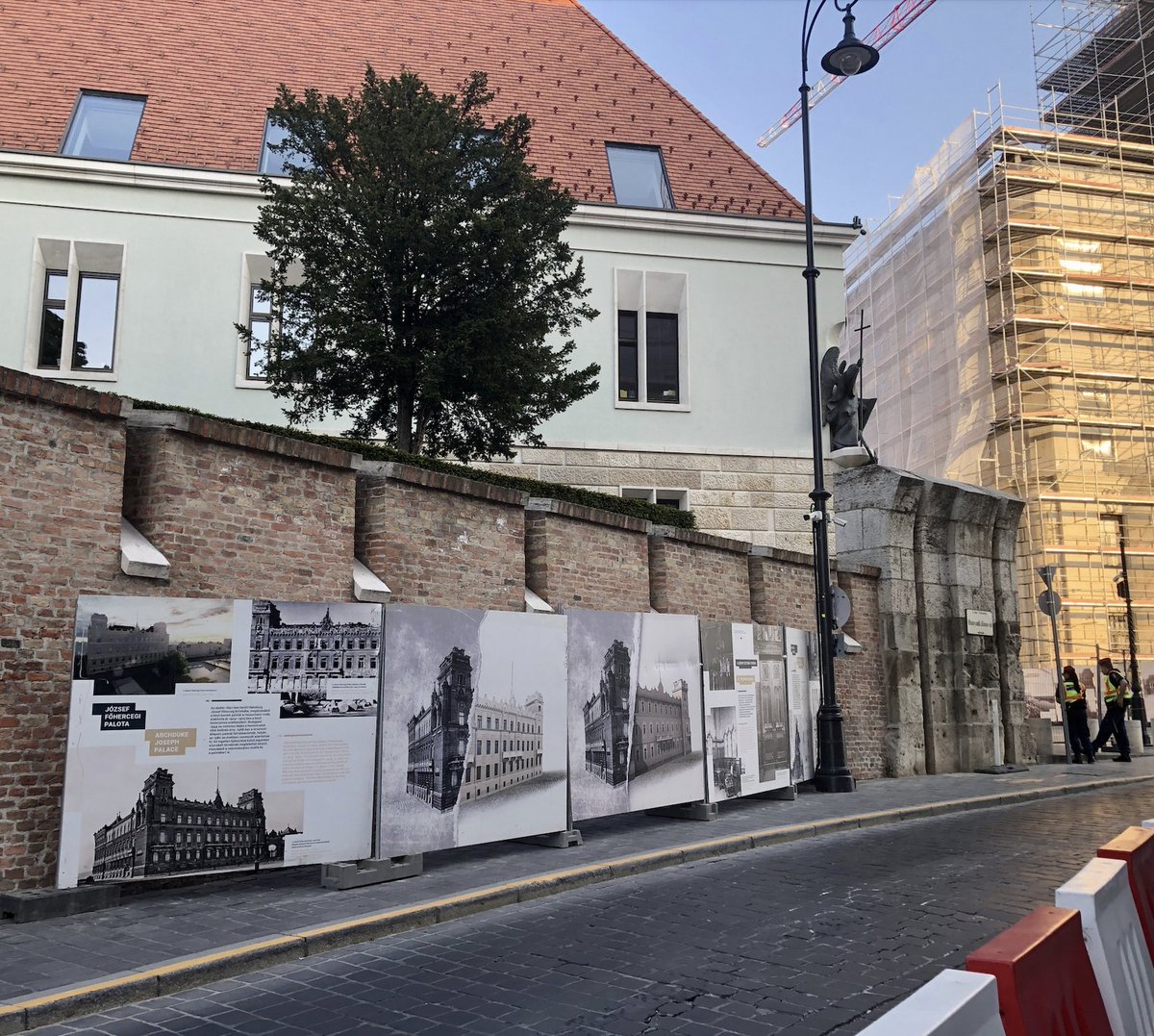 Hungarian students protesting the government tagged Prime Minister Viktor Orbán's office with the message (let's have) "DEMOCRACY!" A few days later, the tag was removed and a cordon was installed to protect the wall from such nefarious messaging. Pics by Tamás Fábián / <a href="/Telexhu/">Telex</a>