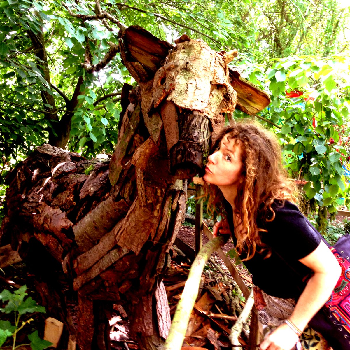 The_Portraits's tweet photo. At @glastonbury everywhere you look there's something to see and embrace. Which Lorraine took seriously with this gorgeous sculpture in the #permaculture area of @GlastoGF in 2013 😆🎶☀️See you there in 48 days! We play THURS #toadhallstage 13:35 &amp; Mandala  20:00 @GlastoFestFeed https://t.co/e7CUNHKaba