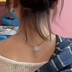 NNVOCALS's tweet photo. No way they put a bandage on the back of her necklace so it fits 😭 https://t.co/MSM07h47m9