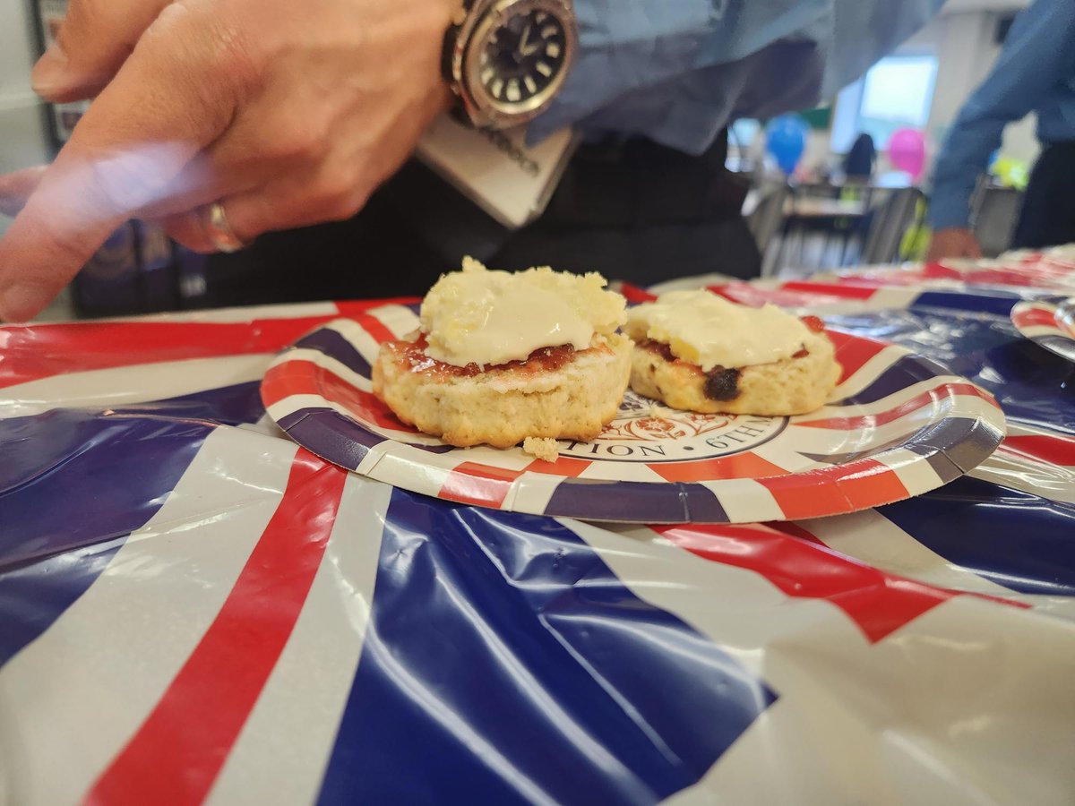 StagecoachSW's tweet photo. We’re celebrating the King’s Coronation with a Cream Tea day here at Stagecoach South West today, although I’m not sure this member of staff has it the right way round! What do you think? #jamorcreamfirst #creamorjamfirst #Coronation https://t.co/5W8Y1TwyQV
