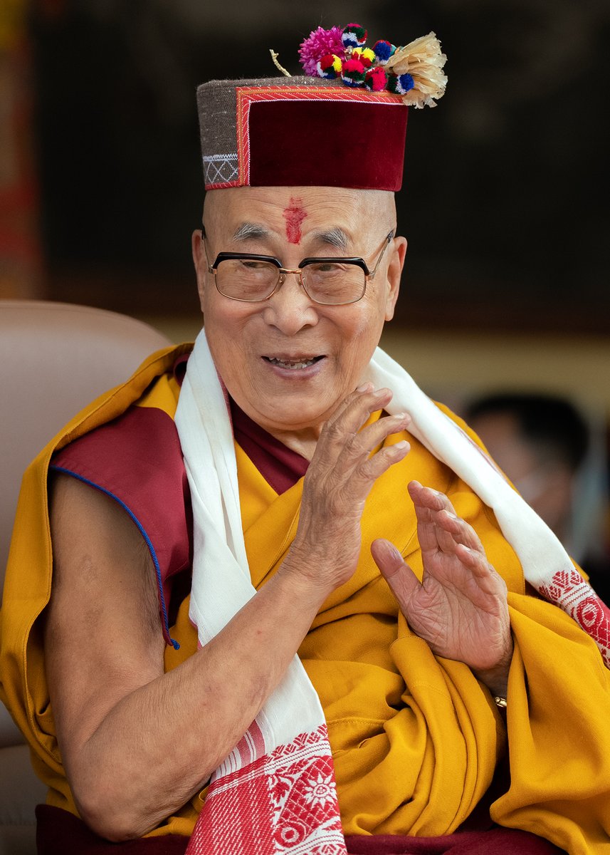 HHDL wearing a traditional hat and shawl from Himachal Pradesh during the Silver Jubilee Celebration of Bharat Tibbat Sahyog Manch at the Main Tibetan Temple courtyard in Dharamsala, HP, India on May 5, 2023. (Photo by Tenzin Choejor)