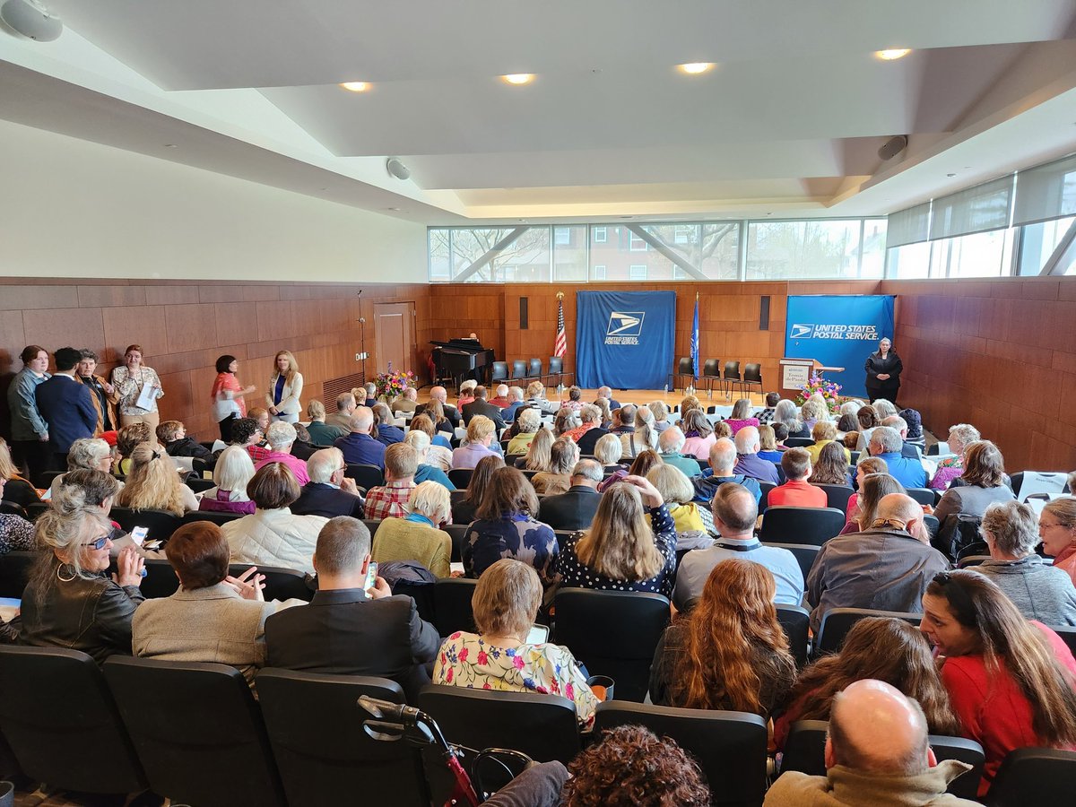 The crowds filling in for the Tomie dePaola Stamp unveiling