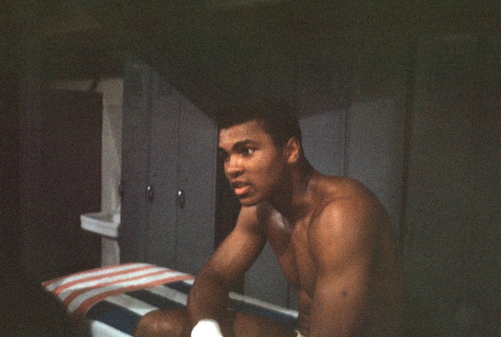 Muhammad Ali in the locker room before his fight vs Sonny Liston at St. Dominic's Arena in Lewiston, ME.

📸: @LeiferNeil 

#MuhammadAli #Icon #Fight #Champion #Boxing #Heavyweight #WorldChampion #SonnyListon