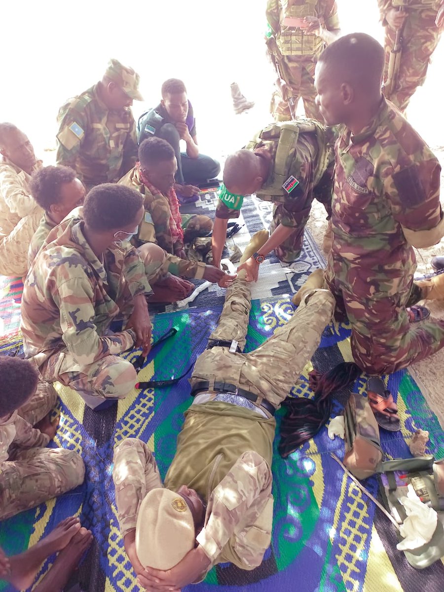 ATMIS_Somalia's tweet photo. #ATMIS and #Somalia Security Forces (#SSF) have completed Combat Medical Training in #Kuday town. Capt. Joel Kemboi, led #ATMIS troops to support #SSF with skills on how to administer first aid, the use of tourniquet, and Tactical Combat Casualty Care. https://t.co/cRbLnDzZPS