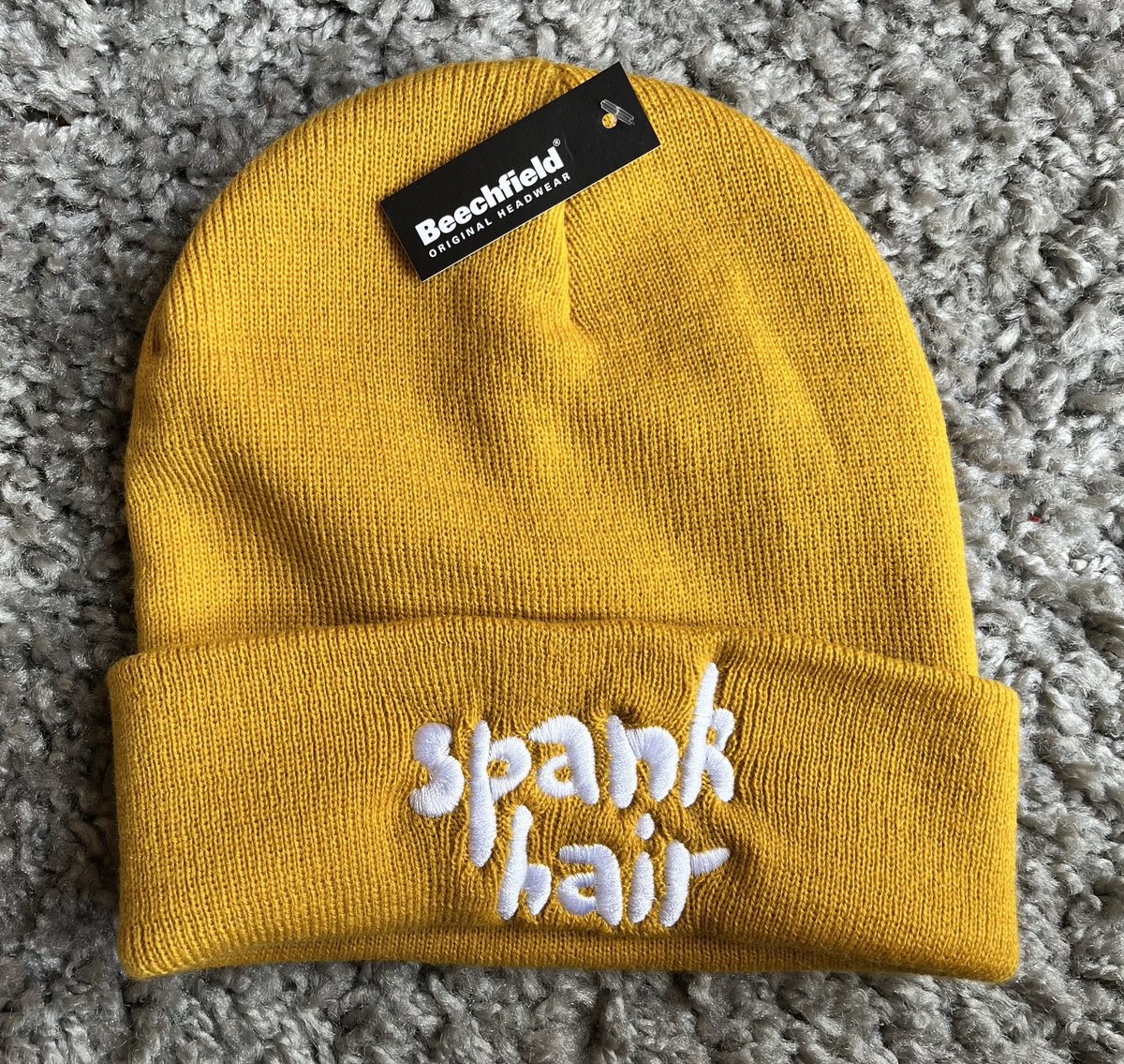 hello twitter legends - its BANDCAMP FRIDAY and I've finally put our winter merch online, just in time for summer! head to spankhair.bandcamp.com/merch if you'd like to support our little band and grab a stylish hat and/or sweatshirt at the same time xxxxxx