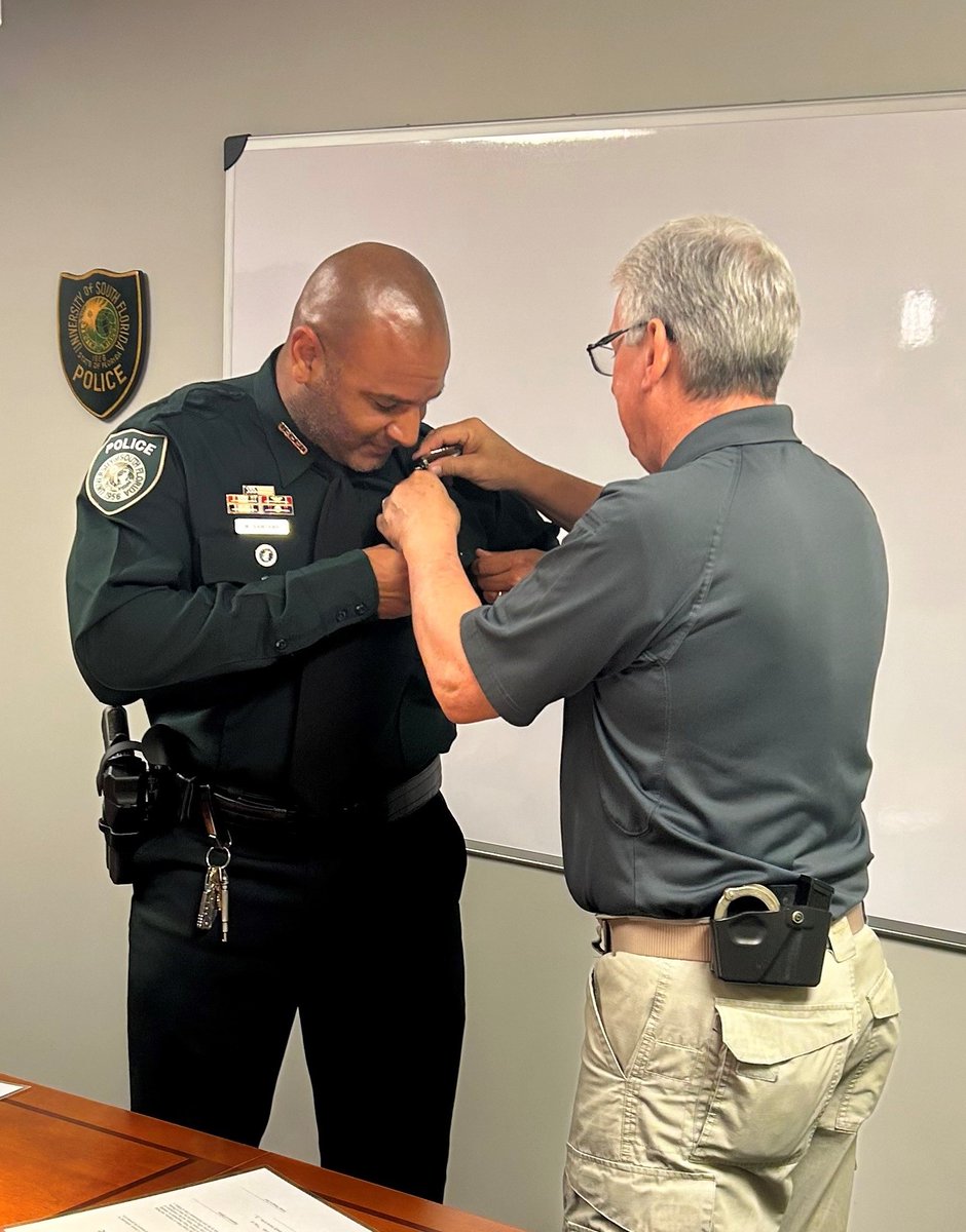 USFPDTampa's tweet photo. Please join us in congratulating Officer Santana on taking his Oath to Serve &amp; Protect the USFPD &amp; its community. Officer Santana joins us from another great Agency, @TempleTerracePD.

Chief Daniel proudly “PINS” Ofc. Santana, to carry on the pride &amp; prestige of the #USFPD https://t.co/LpVcgBD5aM