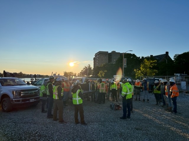 This week is National Construction Safety Week! Our teams across the country have been partaking in daily Safety Talks to continue learning new skills to make our job sites safer. The photos below feature our Druid Lake Team having a Safety Tool Box talk before the work begins.