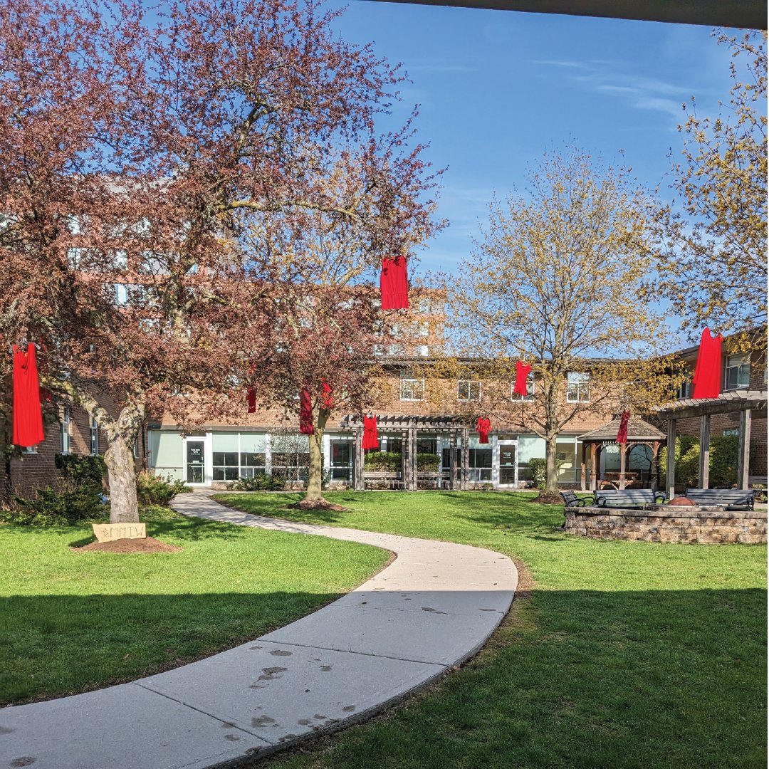 StJeromesUni's tweet photo. Lecturer Andrew Deman and his family have installed red dresses as a symbolic way to recognize this day. This installation can be viewed on the SJU Campus in Alumni Court. The Office of Indigenous Relations at Waterloo is hosting a commemoration ceremony: https://t.co/rokTR3CRYE https://t.co/XkTZA06Cmn