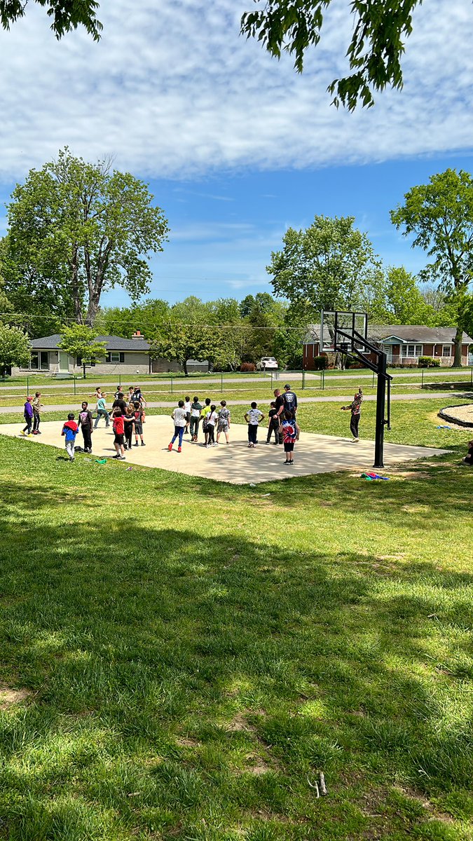Career Day at Guild. Some of our community helpers jumped into a basketball game with the kids.