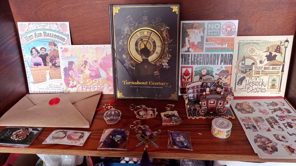 its been a long wait but i finally got to check out <a href="/TGAAzine/">TURNABOUT CENTURY ✨</a>!!! im so happyyyy i love it!
nevermind the cover it got a little wrecked by shipping shenanigans but i still got to enjoy the contents! ❤