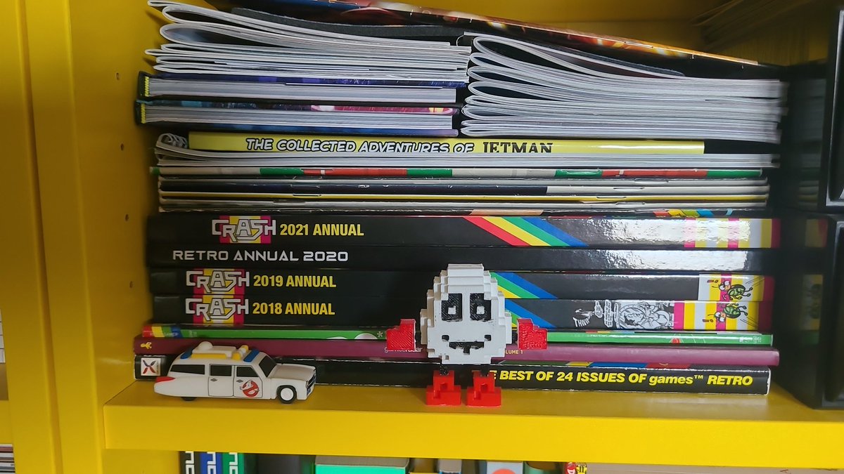 MMckNic's tweet photo. A new edition to the #spectrum shelf. A 3d printed Dizzy takes pride of place in front of #Crash magazines #RetroFusion magazines and various other Spectrum related goodies. Thank you to Mr. @PrettyinGreen79 for the kind gift..I love it! #zxspectrum https://t.co/h0CqOoYgSm