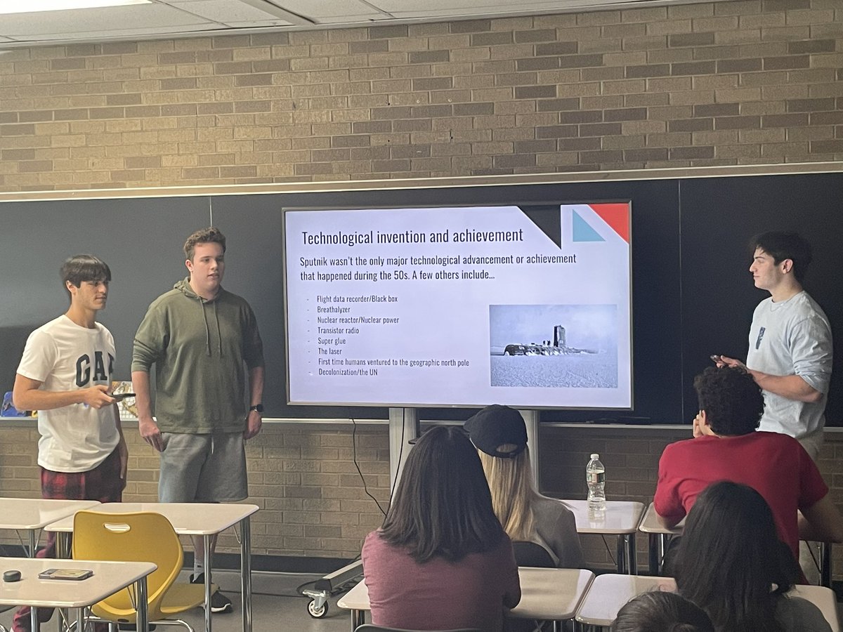 Christian, Jack, &amp; Shaked present their decades project in Ms. Lynch’s Honors Humanities class