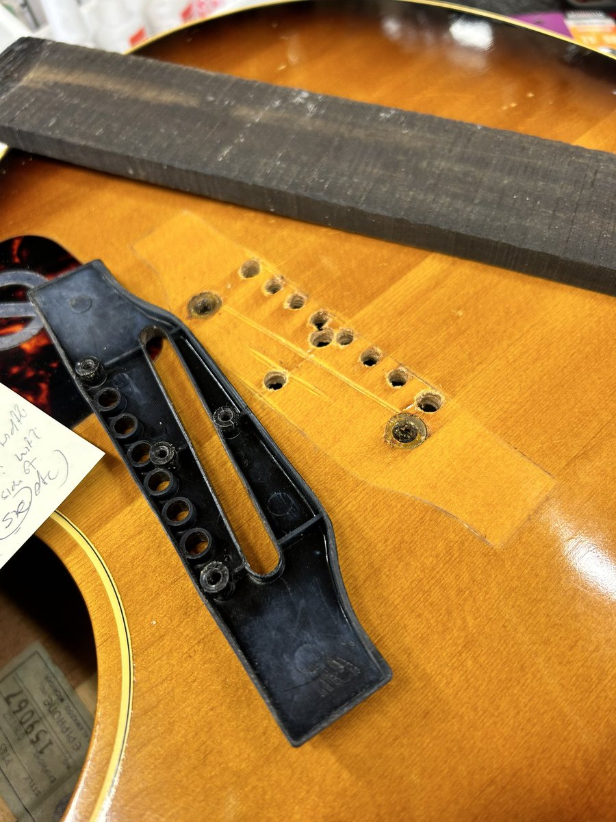 GuitarDoctorUK's tweet photo. Beautiful old Epiphone built by Gibson long ago. Plastic bridge?!! Here's a job I do often, make a new bridge from an ebony blank, exactly to the original's spec 🤙🎸🗜️ #guitar #guitarsofinstagram #guitarrepair #loothing #theloothgroup #luthier https://t.co/D1CVmi7kBX