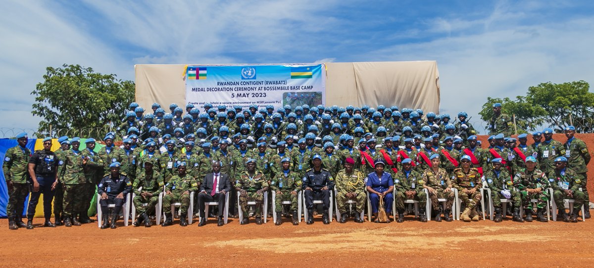 RwandaMoD's tweet photo. On 5 May 2023, Rwandan Peacekeepers under United Nations Multidimensional Integrated Stabilization Mission in the Central African Republic (MINUSCA) were decorated with UN Service Medals in the event that was held at Bossembele Base Camp, at RWABATT2 HQs. https://t.co/59U6FezGIR https://t.co/B3TZWNy5TO