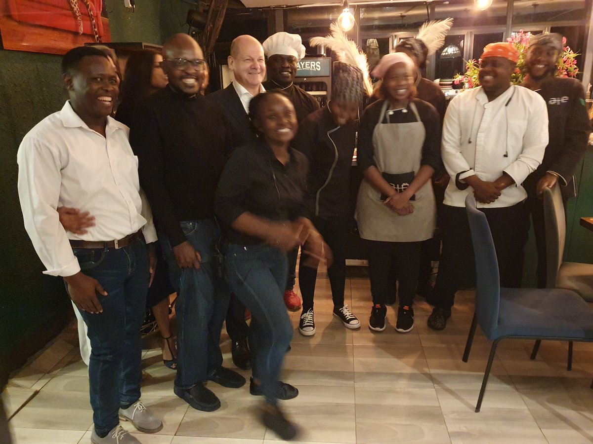 Diplo_Jazz's tweet photo. Last meeting of the day. @Bundeskanzler Olaf Scholz sharing a light moment with kitchen crew of one of the many fantastic #Nairobi restaurants. Ilikuwa kituma sana - asante! https://t.co/O4vvetZ1PS