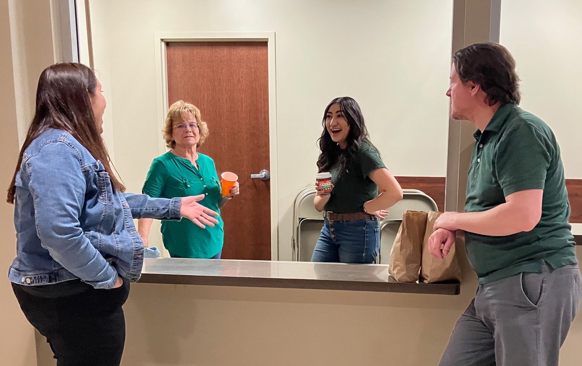 adamsstate's tweet photo. Adams State staffers took a short break after another successful "Gab with a Grizzly" breakfast this morning in Richardson Hall while wearing Grizzly Green. On Fridays, we wear Grizzly Green! #GrizzlyGreen #GrizzlyGreenFriday #AdamsStateGrizzlyGreen #ThisisAdamsState https://t.co/GWJVEpvugx