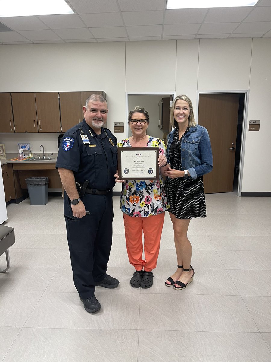 Kudos to Kimberly Johnson, nurse at @CypressParkHS, who was presented a Life Saving Award today by @CFISDPDChief Chief Mendez. @CyFairISD is fortunate to have such awesome nurses ready and able to take great care of our staff and students. #caringforCFISD
