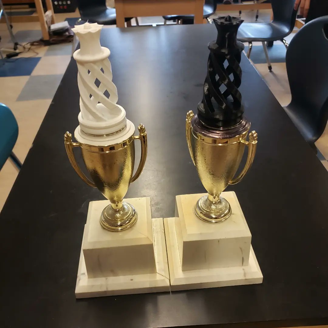 KHSAcademics's tweet photo. Recycled bases, 3D printed tops, and personalized lettering by students in Art 2. Our trophies for the school chess champion and runner up! https://t.co/q0ZQl4dsrE