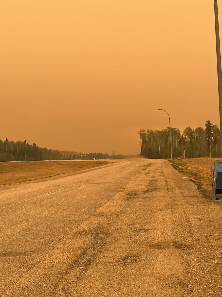 I feel like we are driving through an apocalypse just before Edson. The sky is dark/ yellow and you can see ash flying in the wind. Alberta is literally on fire. Listening to @CBCEdmonton news saying we are 10-15 degrees above normal. This is climate change. #abfire #abpoli