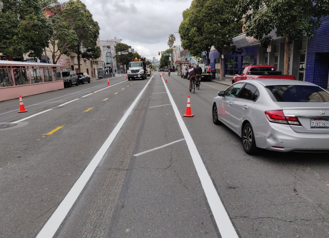 SFMTA_Muni's tweet photo. Rainy weather has impacted construction activities on the mid-Valencia pilot. Thank you for your patience as we continue implementation work. https://t.co/yNxrb8ZZDI