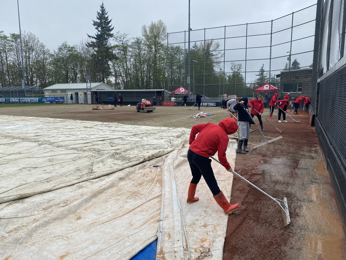 Working hard! We appreciate the work of the <a href="/sfu_athletics/">SFU Athletics</a> softball team and athletic facilities staff for getting the field ready for day two of the #GNACSB Championships.