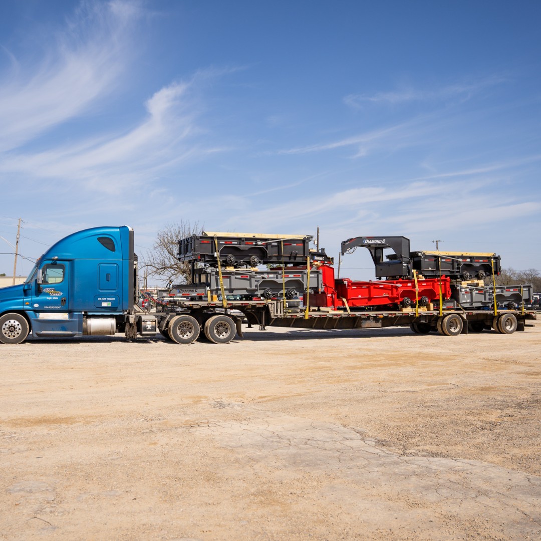 Check out this versatile load full of new LPT Low profile telescopic dump trailers with bumper pull and gooseneck options leaving Diamond C headquarters! 🤠 Where do you think they're headed? 👀 #Customize #DiamondC #DumpTrailer #WhereTo