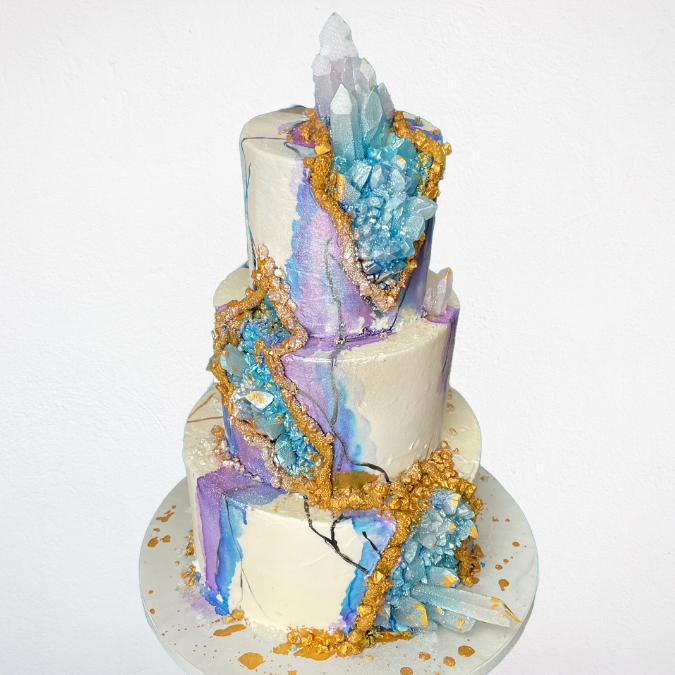 This watercolor and rock candy geode cake is a showstopper! 😍 Not only is it gorgeous, but it also looks almost too good to eat! Who would have known you could make a delicious cake that looks like a beautiful geode?! 

#bakinginspo #dessertgoals #bakerinspo #dessertrecipes