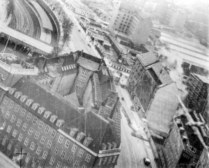 Where’s Wally? Spot the Mosquito. A photograph taken during Operation CARTHAGE, the 140 Wing attack on the Gestapo HQ on 21/3/45. This really was rooftop stuff. You can see smoke rising from the target - the building on the right of the road