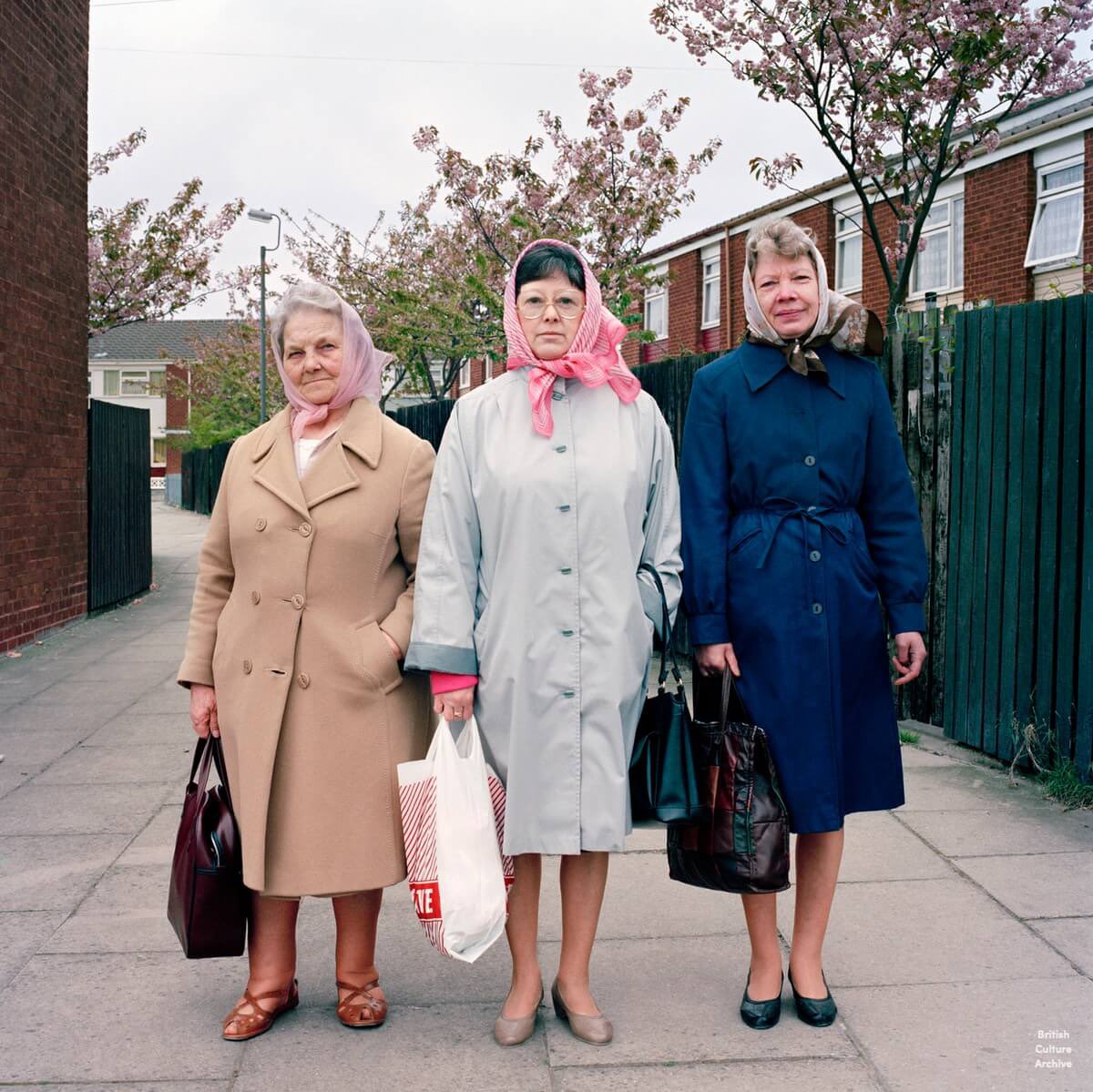 Women of Liverpool, 1980s by Rob Bremner. 1/6. Ladies in Vauxhall, 1987. Photo © Rob Bremner.