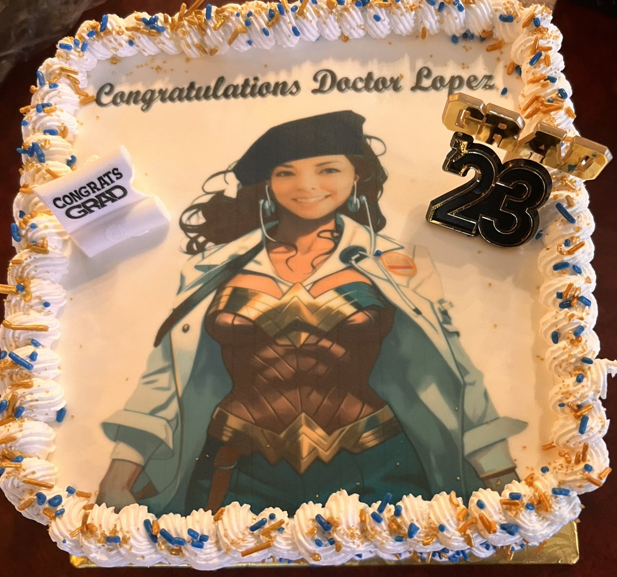 DrKatLo's tweet photo. I need a word to describe the depth of gratitude I’m feeling right now at this very moment. Also, I’m pretty sure I have the best wife ever, using AI and creating a Dr. Wonder Woman image to superimpose my face over… 🤩😉🫶🏼 #DoctoraLopez #glassroofbreaker #Medtwitter @CRL_Esq https://t.co/ROm1fuznSE