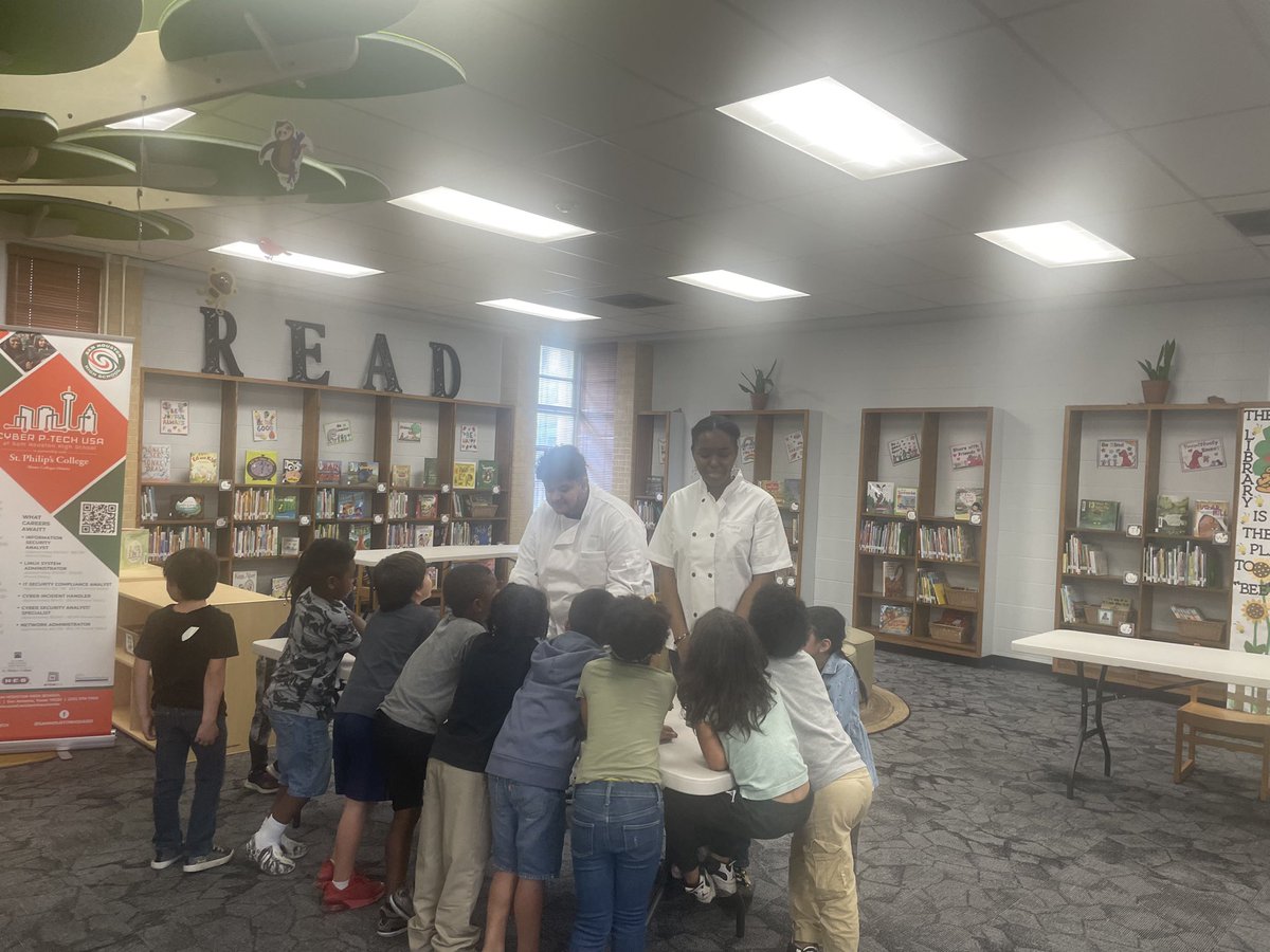 SAISDSamHouston's tweet photo. Sam Houston Career and Technical (CTE) students visited Carroll ECEC today to participate in Career Day. Student leaders from Culinary, Engineering, Health Science and Cybersecurity (PTECH) spoke to Kinder-2nd graders to inspire future careers! #futurecanes #webelieve ๐๐งก https://t.co/5B6WiUHHvP