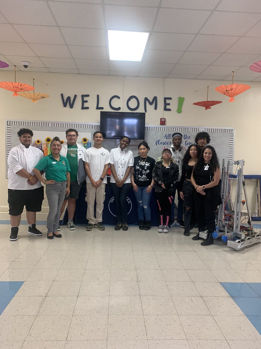 SAISDSamHouston's tweet photo. Sam Houston Career and Technical (CTE) students visited Carroll ECEC today to participate in Career Day. Student leaders from Culinary, Engineering, Health Science and Cybersecurity (PTECH) spoke to Kinder-2nd graders to inspire future careers! #futurecanes #webelieve ๐๐งก https://t.co/5B6WiUHHvP