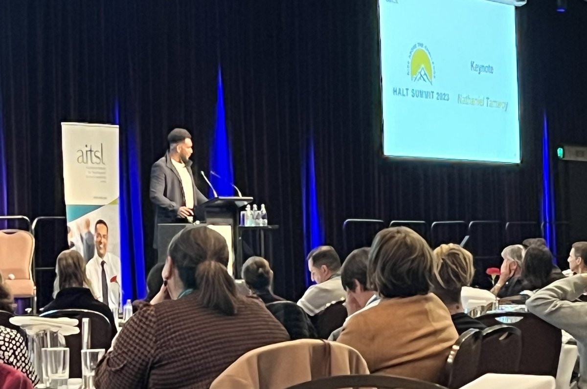 Nathaniel Tamwoy captivating all at the #HALTSummit2023. Challenging our thinking, our actions and our thinking.