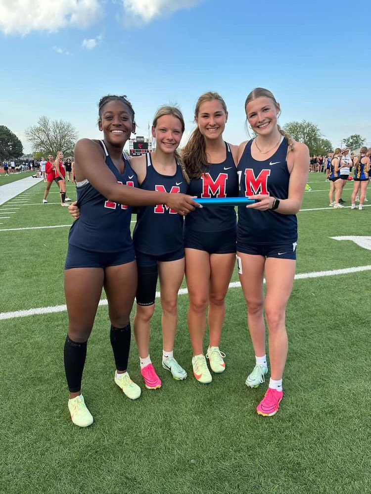 Manhattan Girls break the school’s 4x1 record set in 2015 with a time of 48.83. Hanna Pellant, sophomore, just coming back from an injury. Harli Omli, sophomore who transferred from Goddard-Eisenhower who has the 4x1 record there, along with Aylani Barron, junior. Avery Larson,