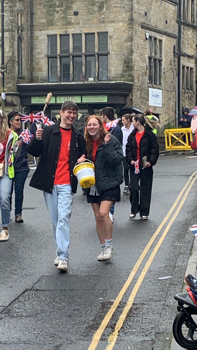 Imberhorne6th's tweet photo. Good to see our students representing us and supporting @ChanzigeA in the coronation parade in town today ☔️ https://t.co/39yHM496bH