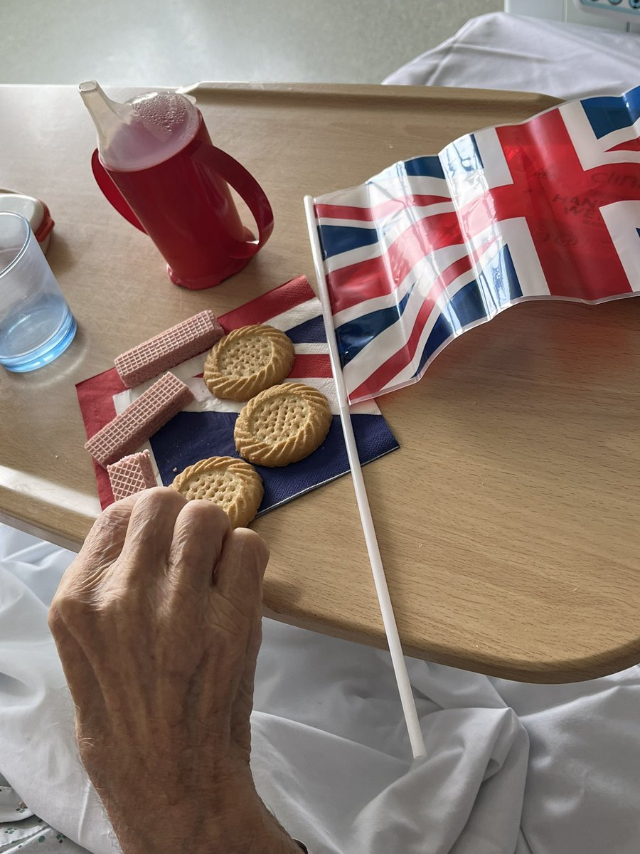 myward2ddh's tweet photo. We are celebrating the king’s coronation on the ward! The TVs are on, the flags and being waved and we are enjoying our tea party!! @amystones4 @louiseclarkson5 @MidYorkshireNHS @RoyalFamily #GodSaveTheKing https://t.co/TGaHejkxM0