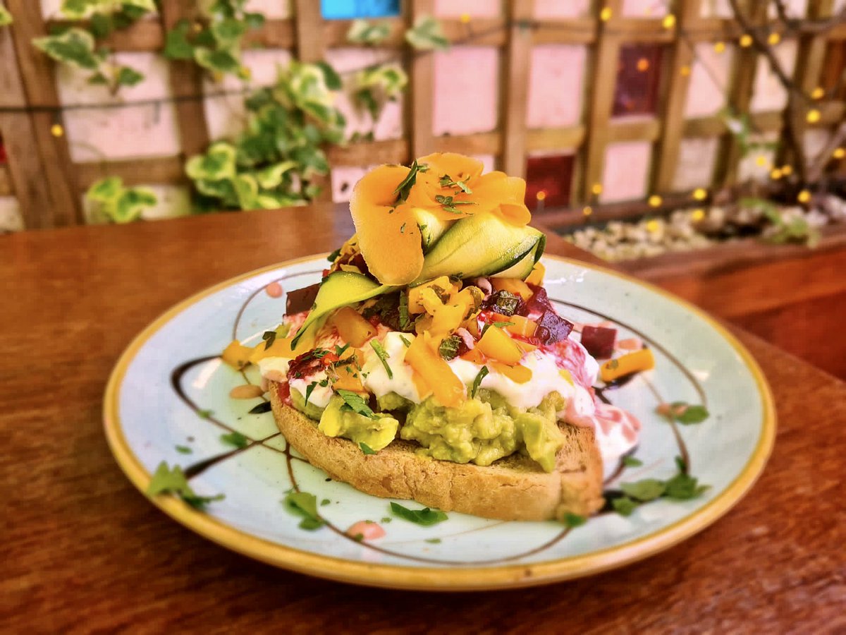 courtyardbath's tweet photo. Our vibrant spring tartine, with smashed avo, garlic and herb whipped feta, beetroot & mango salad and marinated courgette ribbons is back on the menu for the weekend! 🥑
It’s the perfect hit of colour and goodness whatever the weather 💛✨
#eatcolourfully #lunchinbath https://t.co/12MCL1UNFc