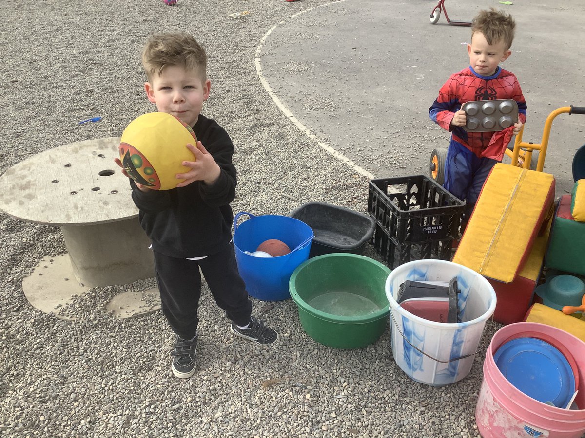 DanestoneN20's tweet photo. Great imagination this week and the use of loose parts. Some tyres were transformed into a house. Then blocks, wooden planks, buckets and crates were transformed in a superhero’s house. “ we have a ball to play football  and cake tin in case we need cakes”. https://t.co/0vUC42xjJb