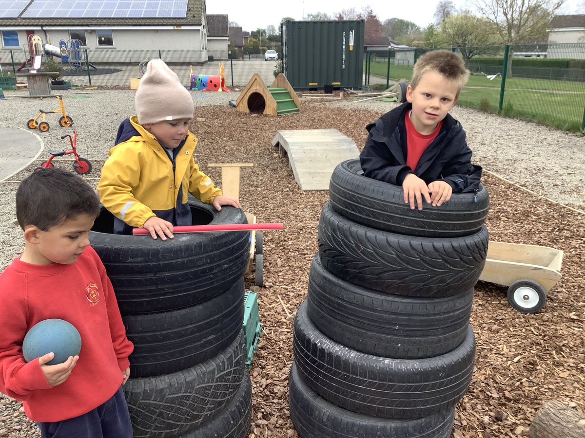 DanestoneN20's tweet photo. Great imagination this week and the use of loose parts. Some tyres were transformed into a house. Then blocks, wooden planks, buckets and crates were transformed in a superhero’s house. “ we have a ball to play football  and cake tin in case we need cakes”. https://t.co/0vUC42xjJb
