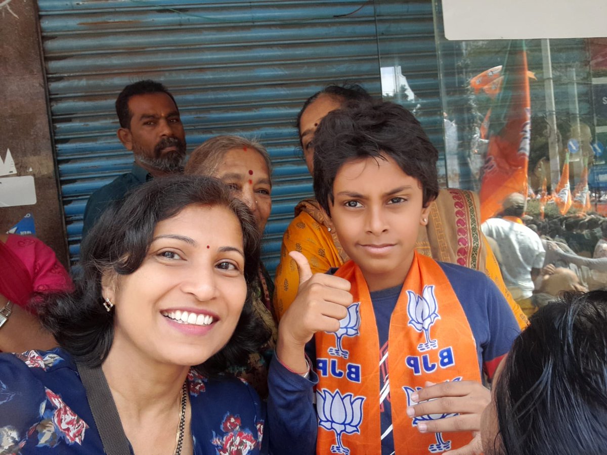 ProfSRK's tweet photo. Today, 1st time, my Akka participated in #ModiRoadShow at #Bengaluru. She was excited to see PM @narendramodi Ji. Crowd was ranging from 1 year kid to 95 years elders. It was truly Mesmerizing to see #ModiHawa #ModiMagic.
#ModiWinningKarnataka #ModiMagic #ModiInBengaluru #ModiJi https://t.co/vB2u12GtDP