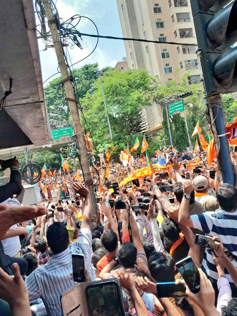 ProfSRK's tweet photo. Today, 1st time, my Akka participated in #ModiRoadShow at #Bengaluru. She was excited to see PM @narendramodi Ji. Crowd was ranging from 1 year kid to 95 years elders. It was truly Mesmerizing to see #ModiHawa #ModiMagic.
#ModiWinningKarnataka #ModiMagic #ModiInBengaluru #ModiJi https://t.co/vB2u12GtDP