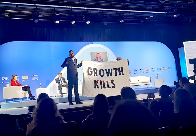 MGSchmelzer's tweet photo. Activists have disrupted the Brussels Economic Forum, arguing that #GrowthKills. Here are their demands: https://t.co/e3moWKqwGC https://t.co/EoOMYyZu4W