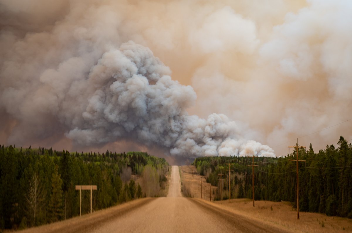 Some of the more grotesque, eerily-coloured smoke plumes I've ever seen tonight over central Alberta wildfires #ABfire #ABstorm