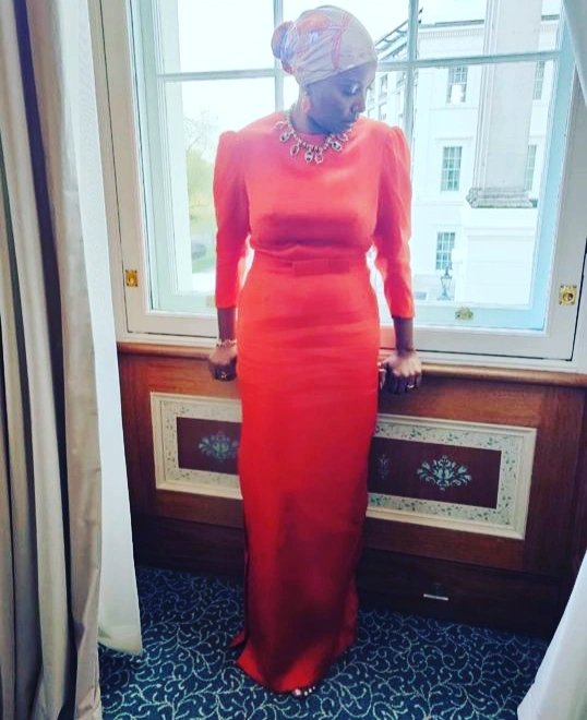 Couronnement du Roi Charles, #guest le premier ministre de Sao Tomé  accompagné son épouse
Nana Trovoado dans une robe Haute Couture en gazar en orange corail dans un style Afrique-cardinale  signée
#imaneayissi  #charlesking #afriquecardinale  #luxurybrand