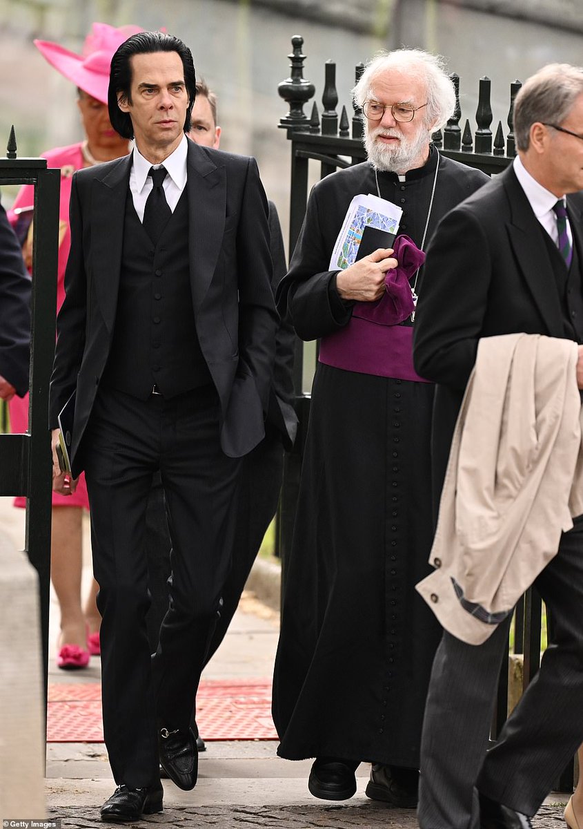 AJMCampbell's tweet image. Unlikely joint arrival of the coronation so far - Nick Cave and Rowan Williams, the former Archbishop of Canterbury.