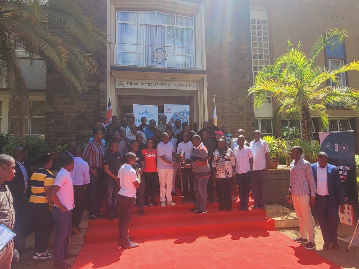 The Awosika Africa Youth Scrabble Championship Trophy being handed over to the governor Uasin Gishu @GovernorBii and CAS sports Hon.Wesley @weskorir by PANASA president Ade @Jeunsoke Gov. Uasin gishu has been vested the Patronage role in Scrabble. #scrabble #uasingishu